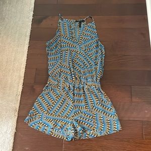 BCBGMaxAzaria romper. Xs. Blue and yellow great condition!!